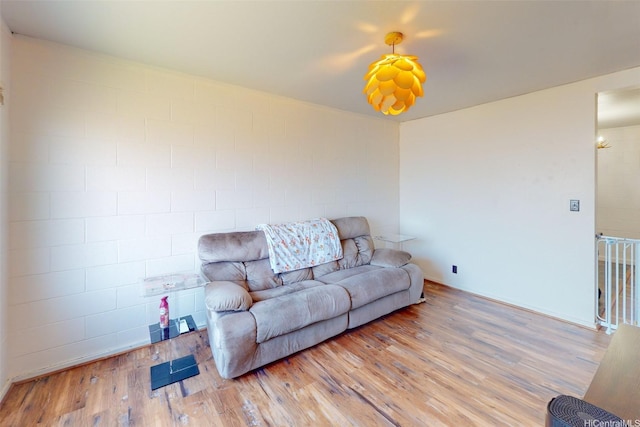 91-652 Kilaha St Unit A4, Ewa Beach, HI 96706 - living room with wood finished floors