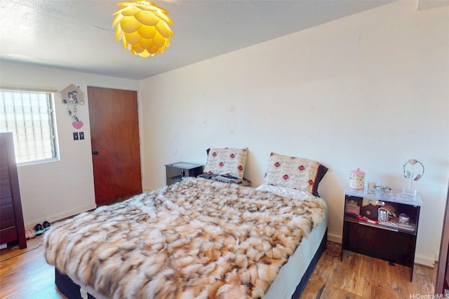91-652 Kilaha St Unit A4, Ewa Beach, HI 96706 - bedroom featuring wood finished floors