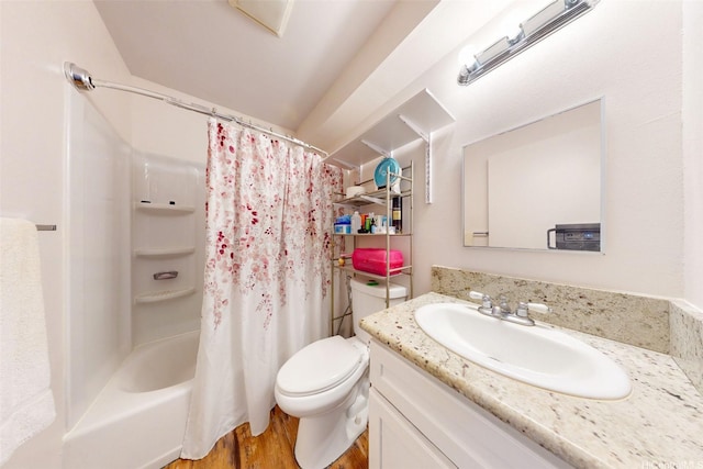 91-652 Kilaha St Unit A4, Ewa Beach, HI 96706 - full bathroom with vanity, wood finished floors, and shower / bath combo with shower curtain