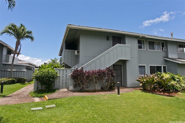 94-1045 Paha Pl Unit T7, Waipahu, HI 96797 - back of property featuring a lawn