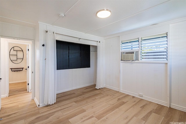 91-517 Pohakupuna Rd, Ewa Beach, HI 96706 - spare room with light wood finished floors, a smoke detector, and cooling unit