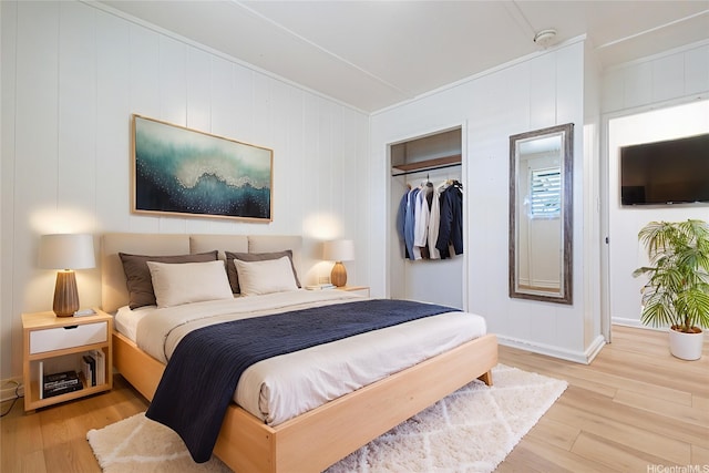 91-517 Pohakupuna Rd, Ewa Beach, HI 96706 - bedroom with wood finished floors, crown molding, and a closet