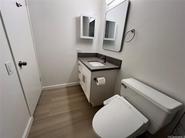 909 Ala Lilikoi St Unit 505, Honolulu, HI 96818 - bathroom with wood finished floors and vanity