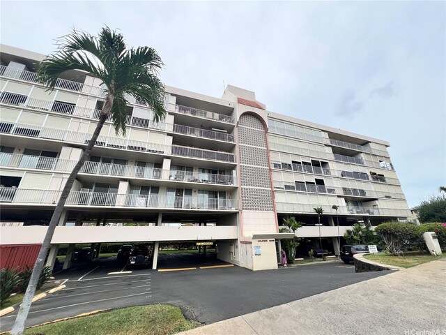 909 Ala Lilikoi St Unit 505, Honolulu, HI 96818 - view of apartment building / complex with covered parking