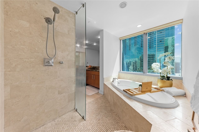 1288 Ala Moana Blvd Unit 21A, Honolulu, HI 96814 - bathroom with a tile shower, a bath, vanity, and tile patterned floors