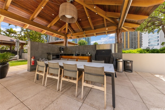 1288 Ala Moana Blvd Unit 21A, Honolulu, HI 96814 - view of patio / terrace with a gazebo, outdoor dining area, and a ceiling fan