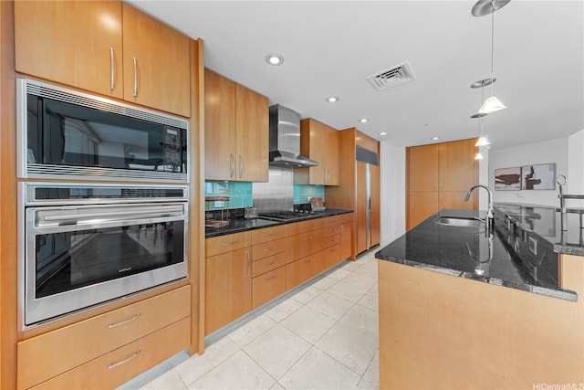1288 Ala Moana Blvd Unit 21A, Honolulu, HI 96814 - kitchen featuring built in appliances, wall chimney exhaust hood, dark stone counters, hanging light fixtures, and light tile patterned floors