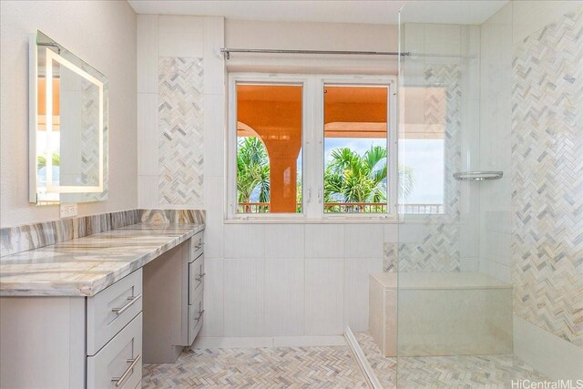 1062 Hoa St, Honolulu, HI 96825 - bathroom featuring vanity, healthy amount of natural light, and a walk in shower