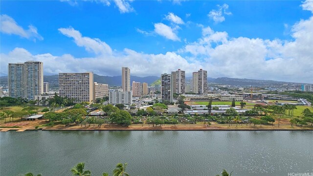 2121 Ala Wai Blvd Unit 1603, Honolulu, HI 96815 - water view featuring nearby urban area and a mountainous background