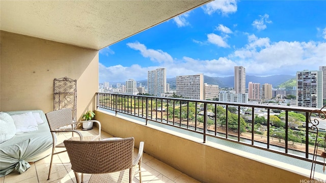 2121 Ala Wai Blvd Unit 1603, Honolulu, HI 96815 - balcony featuring a skyline view and a mountain view