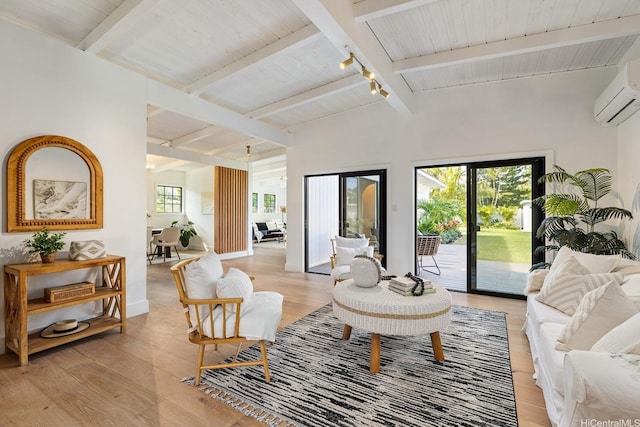 114 Kaelepulu Dr, Kailua, HI 96734 - living room featuring light wood finished floors, a wall mounted air conditioner, wooden ceiling, and baseboards