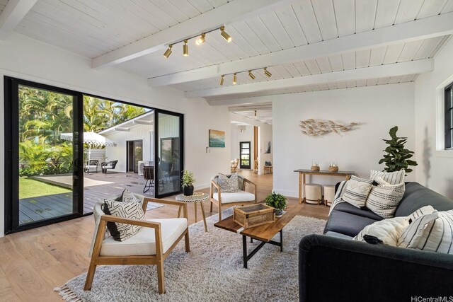 114 Kaelepulu Dr, Kailua, HI 96734 - living room with light wood-style flooring, wooden ceiling with exposed beams, track lighting, and baseboards