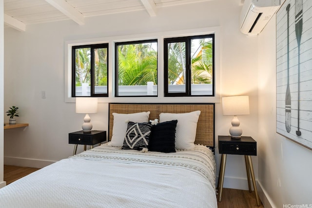 114 Kaelepulu Dr, Kailua, HI 96734 - bedroom with beam ceiling, multiple windows, an AC wall unit, wood finished floors, and baseboards