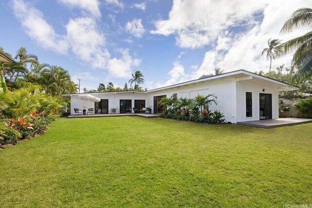 114 Kaelepulu Dr, Kailua, HI 96734 - back of property with a patio area and a yard