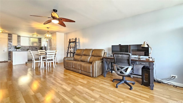 1717 Ala Wai Blvd Unit 2002, Honolulu, HI 96815 - office area with ceiling fan and light wood-style floors