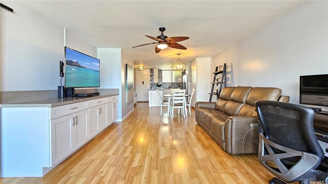1717 Ala Wai Blvd Unit 2002, Honolulu, HI 96815 - living area featuring ceiling fan and light wood-style flooring