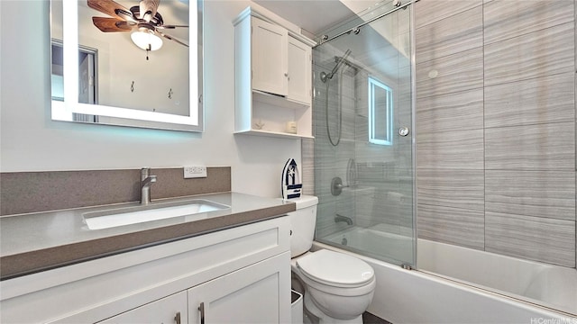 1717 Ala Wai Blvd Unit 2002, Honolulu, HI 96815 - bathroom with toilet, bath / shower combo with glass door, vanity, and ceiling fan