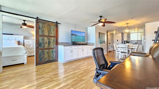 1717 Ala Wai Blvd Unit 2002, Honolulu, HI 96815 - home office with ceiling fan, light wood-type flooring, and a barn door