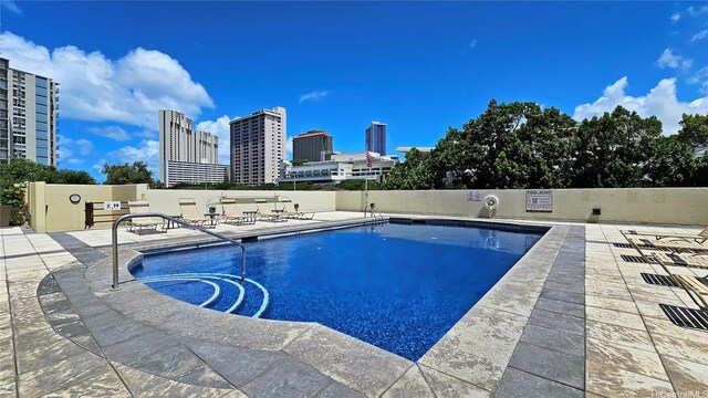 1717 Ala Wai Blvd Unit 2002, Honolulu, HI 96815 - community pool with a skyline view and a patio area