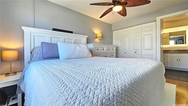 1717 Ala Wai Blvd Unit 2002, Honolulu, HI 96815 - bedroom with dark wood finished floors, a closet, and ceiling fan