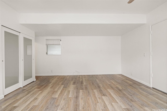 1447 Kewalo St Unit 101, Honolulu, HI 96822 - spare room featuring light wood-style flooring and baseboards