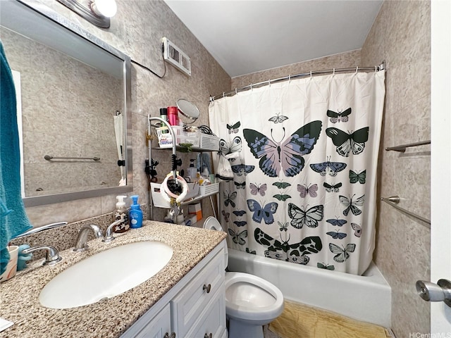 5210 Likini St Unit 810, Honolulu, HI 96818 - full bath featuring vanity, shower / tub combo, toilet, and tile walls