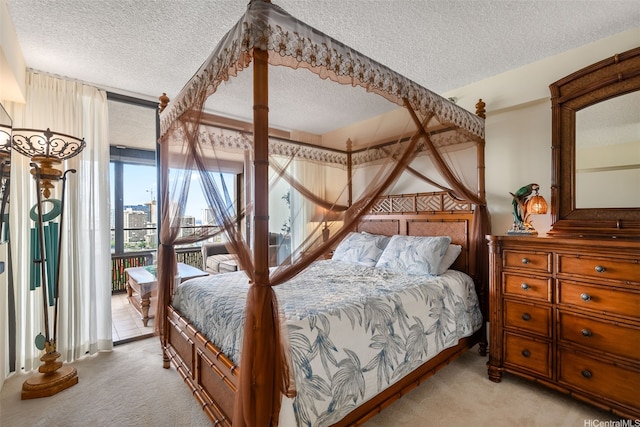 583 Kamoku St Unit Dh2303, Honolulu, HI 96826 - bedroom featuring light colored carpet, access to exterior, and a textured ceiling