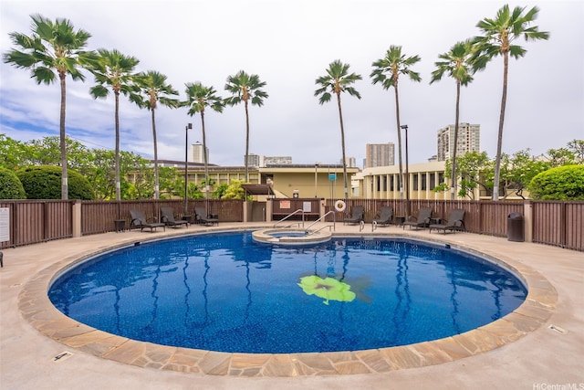 583 Kamoku St Unit Dh2303, Honolulu, HI 96826 - view of pool featuring a patio and a pool with connected hot tub