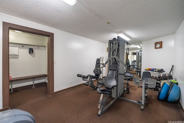 583 Kamoku St Unit Dh2303, Honolulu, HI 96826 - exercise room with a textured ceiling and carpet floors