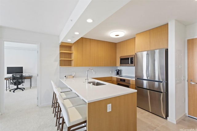 1388 Kapiolani Blvd Unit 3701, Honolulu, HI 96814 - kitchen with stainless steel appliances, open shelves, a peninsula, a breakfast bar, and light countertops