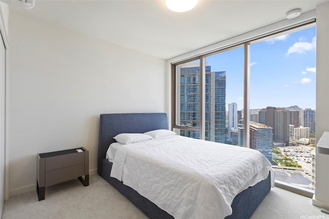 1388 Kapiolani Blvd Unit 3701, Honolulu, HI 96814 - carpeted bedroom featuring a city view and baseboards