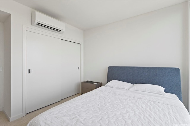 1388 Kapiolani Blvd Unit 3701, Honolulu, HI 96814 - bedroom featuring a wall unit AC, light colored carpet, and a closet
