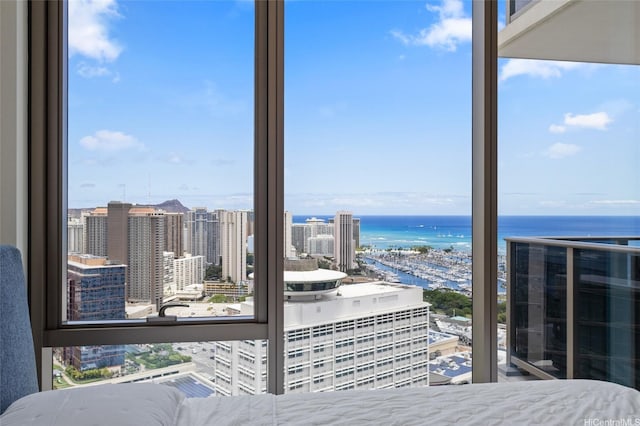 1388 Kapiolani Blvd Unit 3701, Honolulu, HI 96814 - bedroom with a water view and a view of city