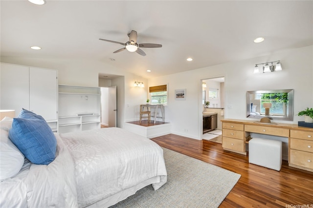 1226 Kahili St, Kailua, HI 96734 - bedroom featuring dark wood-type flooring, lofted ceiling, an office area, recessed lighting, and connected bathroom
