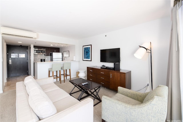 1777 Ala Moana Blvd Unit 2430, Honolulu, HI 96815 - living room with a wall mounted air conditioner and track lighting