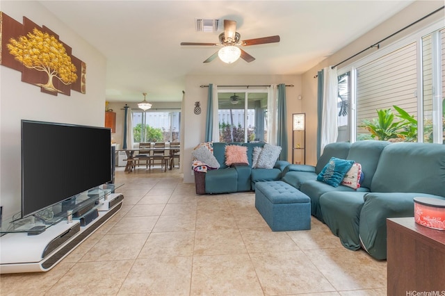 91-1152 Paapaana St, Ewa Beach, HI 96706 - living area with ceiling fan and light tile patterned floors
