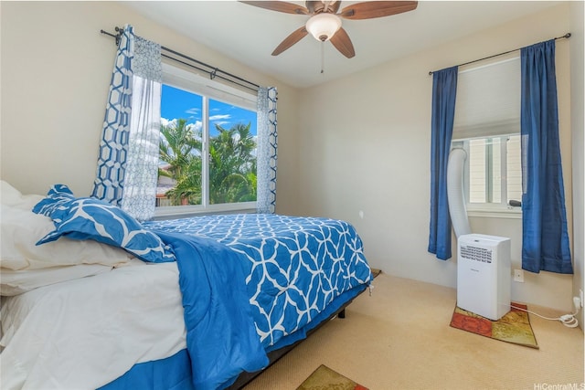91-1152 Paapaana St, Ewa Beach, HI 96706 - carpeted bedroom featuring multiple windows and a ceiling fan