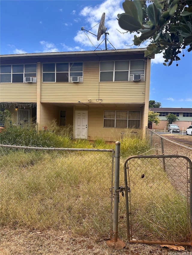 85-173 Ala Akau St Unit A, Waianae, HI 96792 - view of front facade featuring a gate and cooling unit