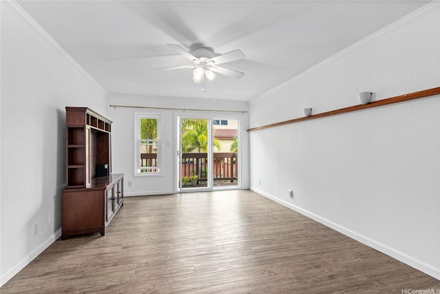 46-078 Emepela Pl Unit G205, Kaneohe, HI 96744 - unfurnished living room with ceiling fan, crown molding, wood finished floors, and baseboards