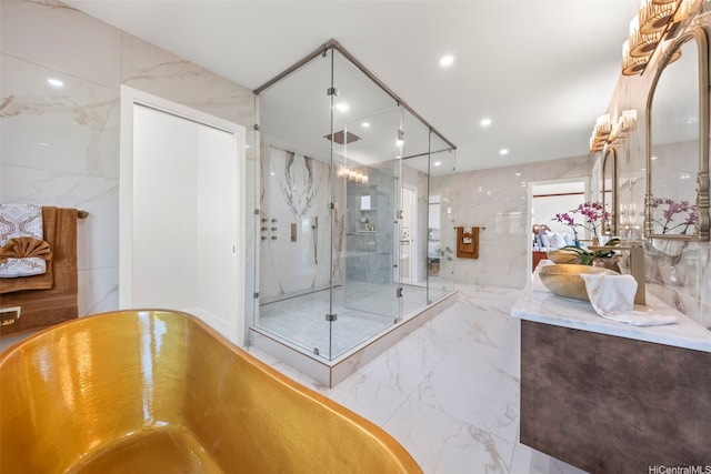 123 Waihili Pl, Honolulu, HI 96825 - full bath with a marble finish shower, marble tiled flooring, vanity, a freestanding bath, and recessed lighting