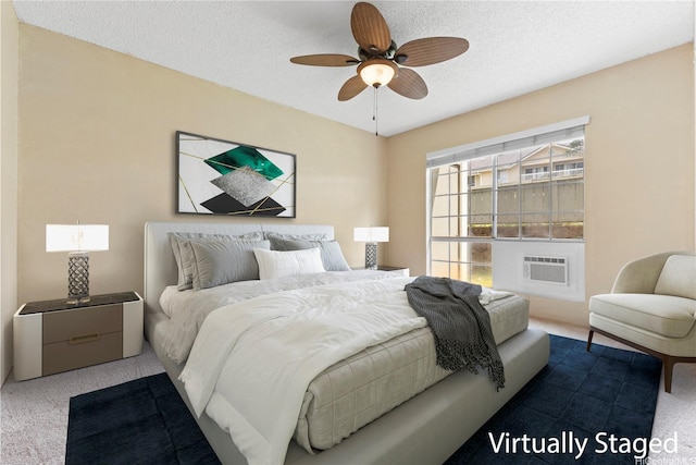 94-1336 Kulewa Loop Unit 5D, Waipahu, HI 96797 - carpeted bedroom featuring a textured ceiling, a ceiling fan, and an AC wall unit