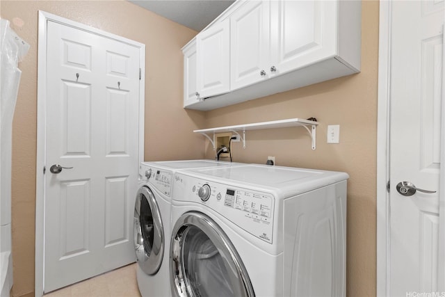 94-1336 Kulewa Loop Unit 5D, Waipahu, HI 96797 - washroom featuring cabinet space and separate washer and dryer