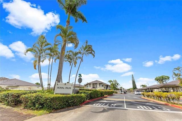 94-1336 Kulewa Loop Unit 5D, Waipahu, HI 96797 - view of asphalt road featuring traffic signs, curbs, and a residential view