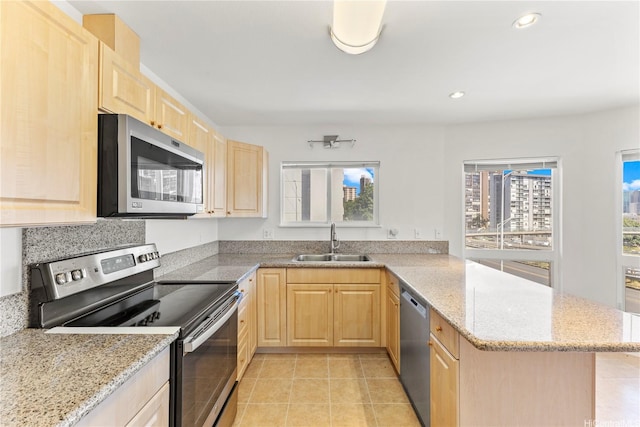 1410 Alapai St Unit 5, Honolulu, HI 96813 - kitchen with appliances with stainless steel finishes, light brown cabinets, a sink, light tile patterned floors, and recessed lighting