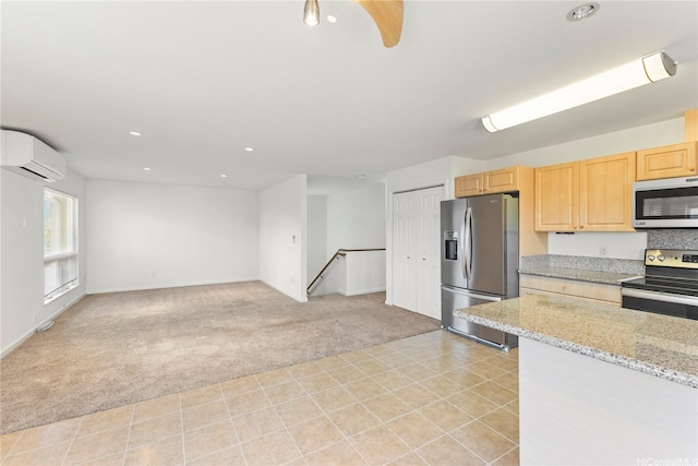1410 Alapai St Unit 5, Honolulu, HI 96813 - kitchen with appliances with stainless steel finishes, light carpet, a wall mounted AC, light brown cabinets, and recessed lighting