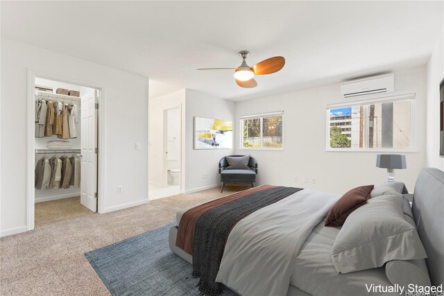 1410 Alapai St Unit 5, Honolulu, HI 96813 - carpeted bedroom with a wall mounted air conditioner, a spacious closet, ceiling fan, ensuite bathroom, and baseboards
