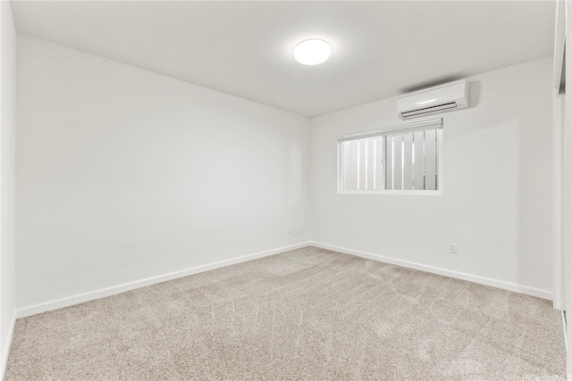 1410 Alapai St Unit 5, Honolulu, HI 96813 - carpeted spare room with a wall mounted AC and baseboards