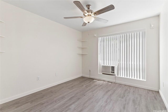 91-225 Hanapouli Cir Unit 33F, Ewa Beach, HI 96706 - spare room with wood finished floors, ceiling fan, and cooling unit
