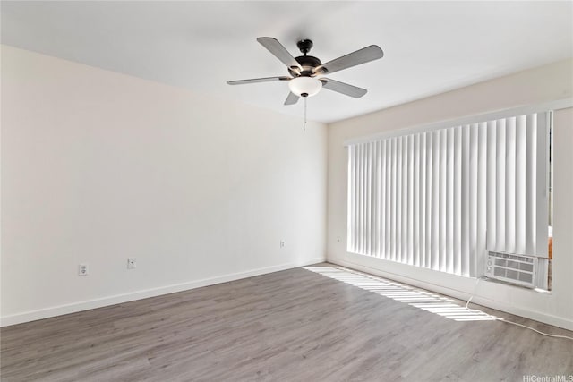 91-225 Hanapouli Cir Unit 33F, Ewa Beach, HI 96706 - unfurnished room featuring wood finished floors and a ceiling fan