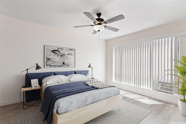 91-225 Hanapouli Cir Unit 33F, Ewa Beach, HI 96706 - bedroom featuring wood finished floors and a ceiling fan